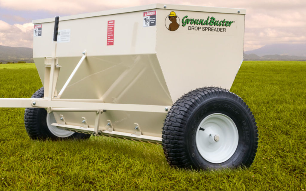 drop spreader to dispense agricultural lime
