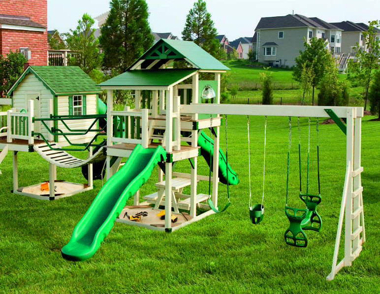 Playsafe brand swingset in backyard